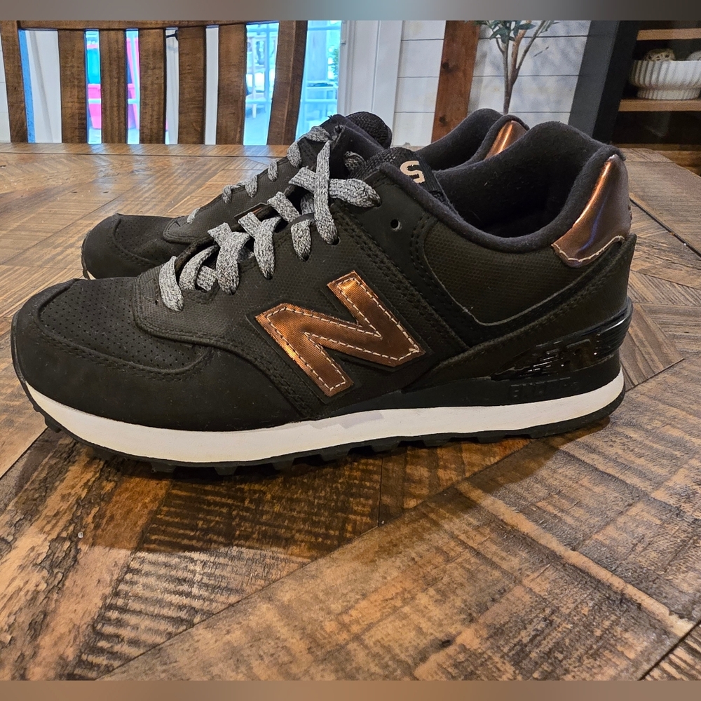 New Balance Women's 574 Size 6 Black and Bronze Sneakers
